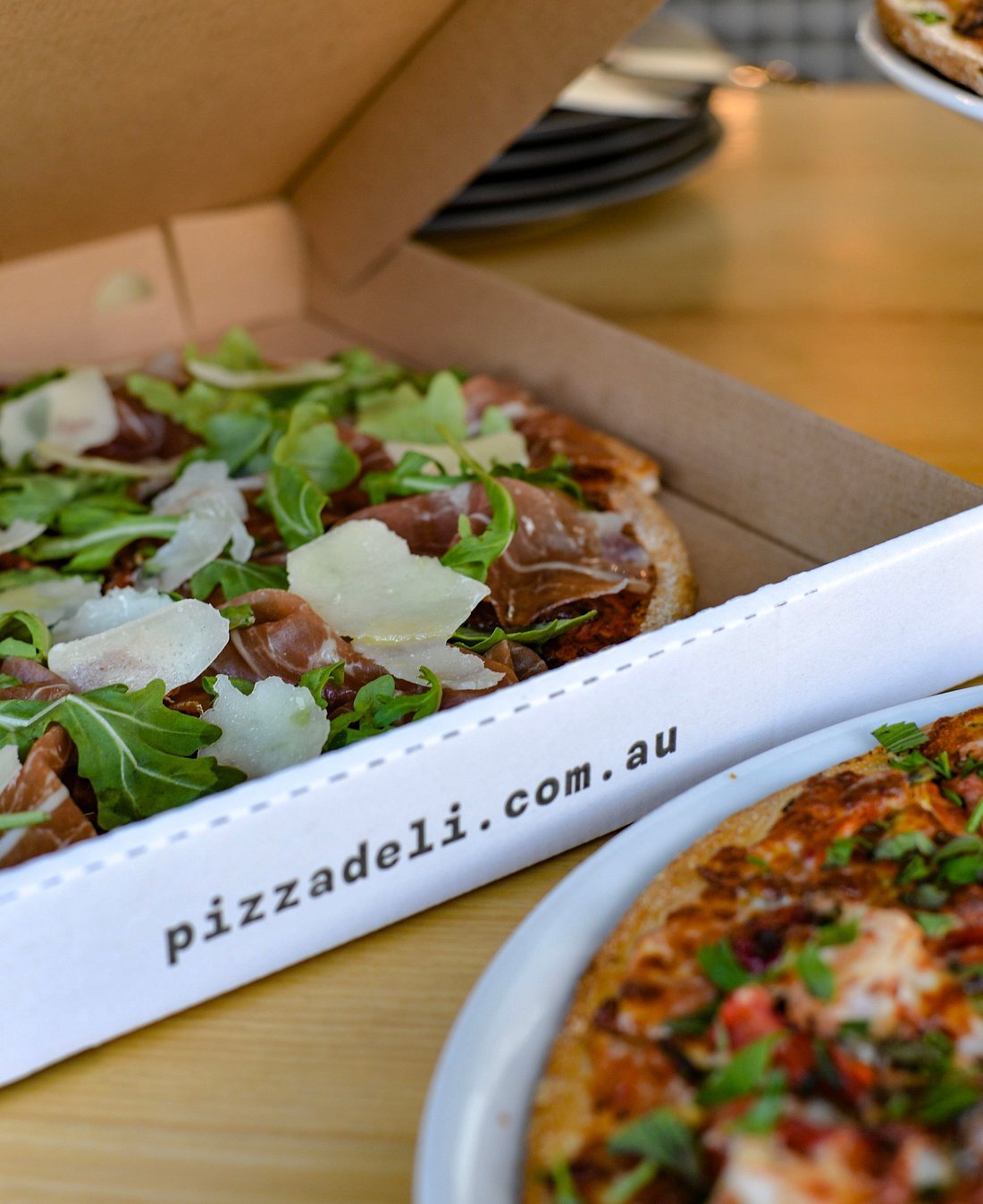 Pizza in branded Pizza:deli box